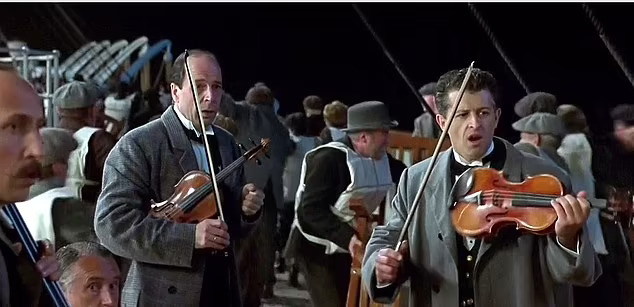 91897607-14064419-_You_know_when_the_Titanic_is_going_down_and_the_violinist_stand-a-29_1731207279532_11zon