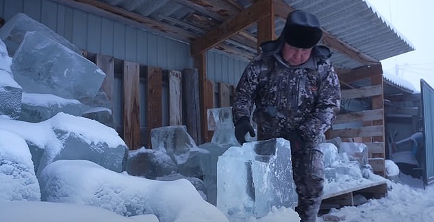 6-triarch_can_be_seen_hauling_a_clear_block_of_ice_from_the_-a-1_1707242425472