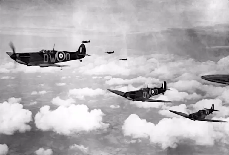 several-raf-spitfire-aircraft-flying-above-the-clouds