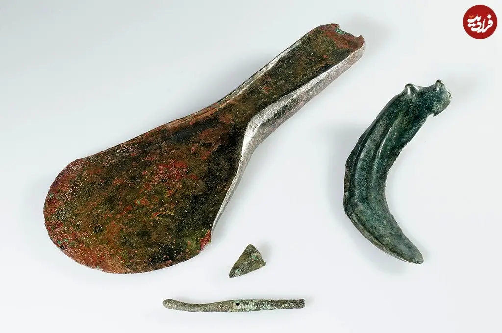 flanged-axe-button-shaped-sickle-pin-and-fragment-of-an-arrowhead