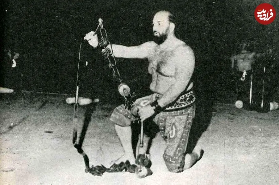 عکس| سفر در زمان؛ «شعبان بی مخ» در حال کباده کشی در استادیوم امجدیه؛ سال 49