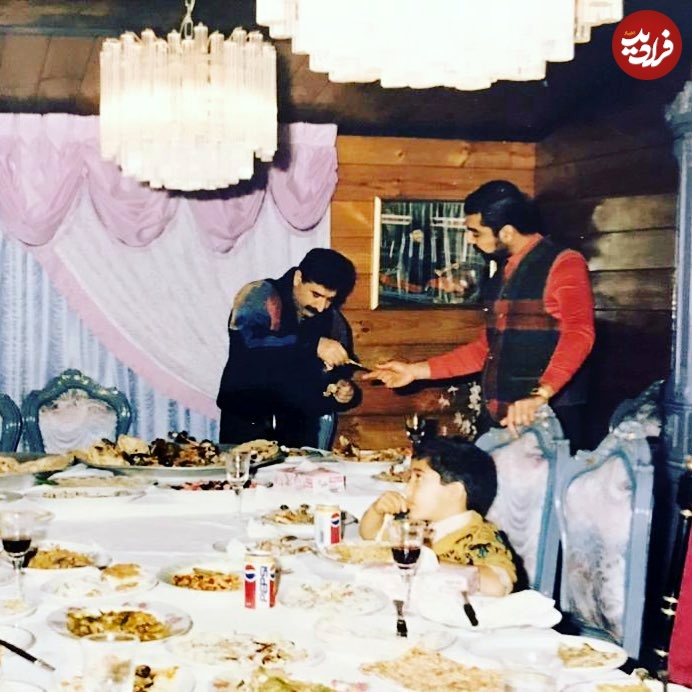 عکس| سفر در زمان؛ «پسر و داماد بی رحم صدام» در یک مهمانی خصوصی؛ دهه 60 عکس| سفر در زمان؛ «پسر و داماد بی رحم صدام» در یک مهمانی خصوصی؛ دهه 60