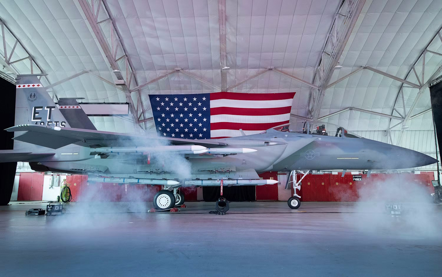 photo-of-f-15ex-in-front-of-us-flag