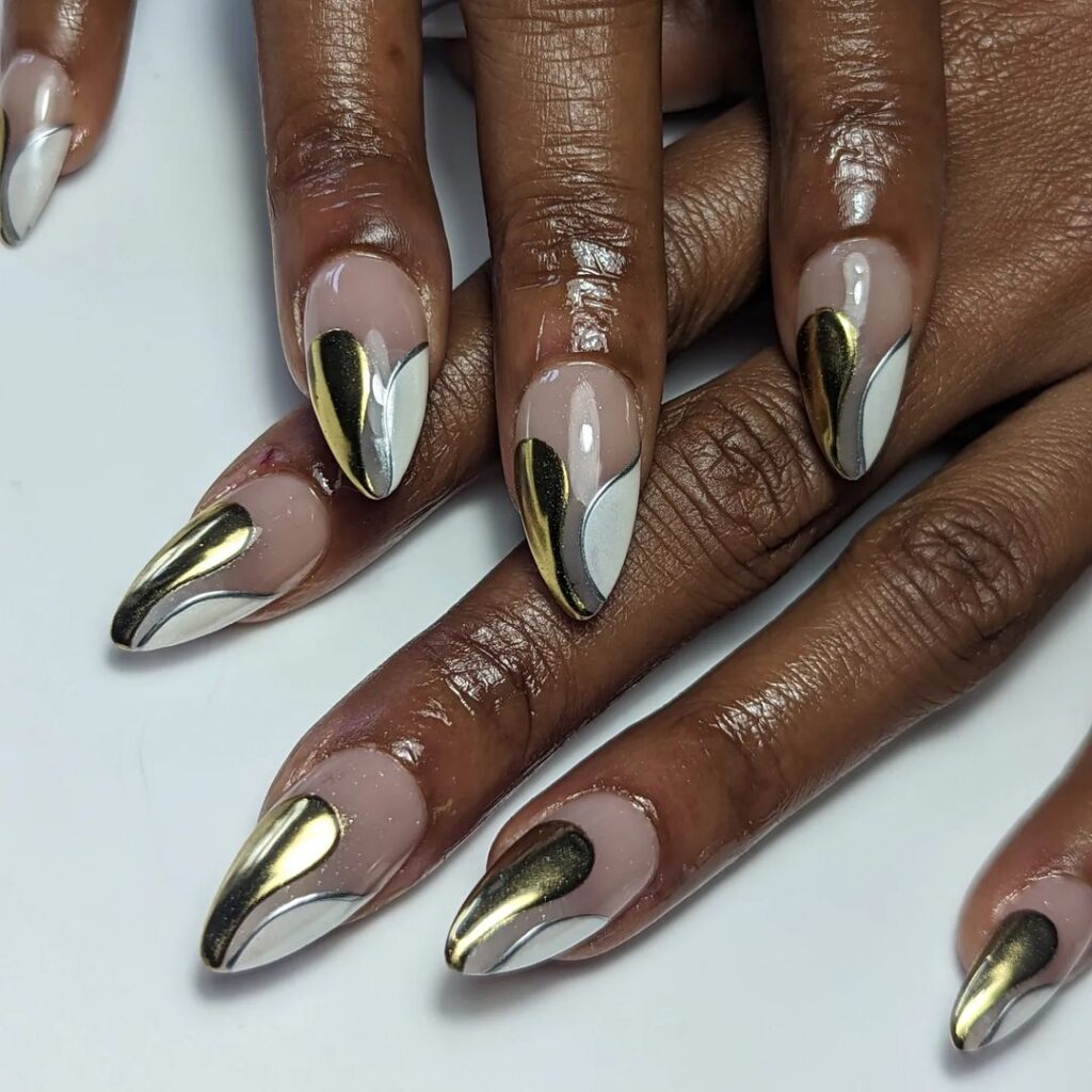 Mix-metals-and-swirls-@swiisg-thanks-for-coming-to-see-me-on-your-trip-nails-love-metal-extensions-1024x1024