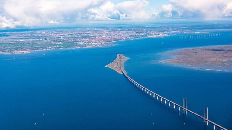 0_aerial-view-of-the-resund-bridge-entering-peberholm-island-768x432