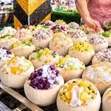 ببینید| غذای خیابانی در تایلند؛ تهیه یک غذای محبوب با نارگیل، برنج و دوریان در بانکوک