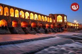 عکس؛ سفر به تاریخ؛ بساط کاهو سکنجبین فروشی در کنار پل خواجو؛ سال 43
