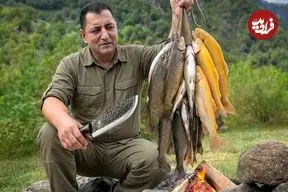 ببینید| غذای روستایی در آذربایجان؛ صید ماهی قزل آلا و کباب کردن آن روی سنگ