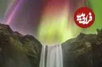 بارش رنگ‌های شفق قطبی‌ روی یک‌ آبشار در عکس روز ناسا
