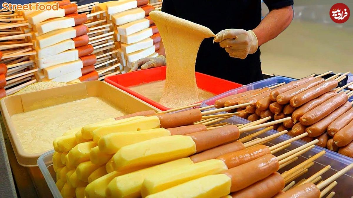 ببینید؛ غذای خیابانی در آمریکا؛ تهیه هات داگ پنیری در نیویورک