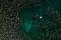 (عکس) این روستای شگفت انگیز از کف دریاچه مرموز بیرون زده!