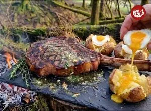 ببینید| غذای روستایی در انگلیس؛ پخت استیک تاماهاوک روی سنگ داغ در جنگل