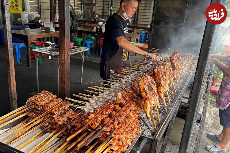 ببینید| غذای خیابانی در تایلند؛ فرآیند تهیه 150 کیلو مرغ کبابی در بانکوک 