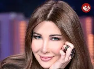 عکس| سفر در زمان؛ «نانسی عجرم» در کنار تصویر نخست وزیر مقتول لبنان در بیروت؛ سال 1384