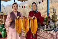 (ویدئو) غذای روستایی در گیلان؛ پخت سبزی پلو با ماهی قزل آلا