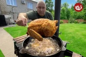 ببینید| غذای روستایی در روسیه؛ پخت مرغ سوخاری کامل به روشی متفاوت