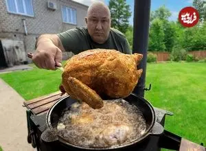 ببینید| غذای روستایی در روسیه؛ پخت مرغ سوخاری کامل به روشی متفاوت