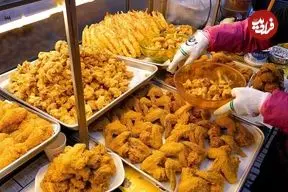 ببینید| غذای خیابانی در کره؛ تهیه مرغ و میگوی سوخاری در سئول