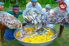 ببینید| غذای روستایی در هند؛ پخت املت با 700 عدد تخم مرغ، میگو، ماهی و خرچنگ