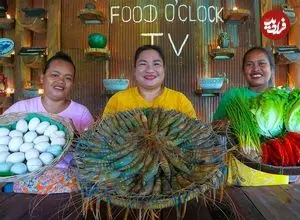 ببینید| غذای روستایی در سنگاپور؛ پخت یک غذای سنتی با میگو، تخم مرغ و سبزیجات