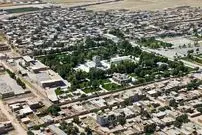 عکس| سفر به ایران قدیم؛ مردی با الاغ در حال عبور از یک پل در نزدیکی توس؛ 125 سال قبل