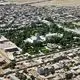 عکس| سفر به ایران قدیم؛ مردی با الاغ در حال عبور از یک پل در نزدیکی توس؛ 125 سال قبل