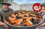 ببینید| غذای روستایی در آذربایجان؛ پخت خوراک با میگوی ببری و صدف در روستا