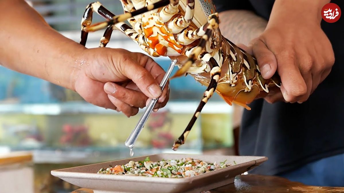 ببنیید؛ برش ماهرانه خرچنگ غول پیکر رنگین کمانی و پخت غذا با آن در ویتنام