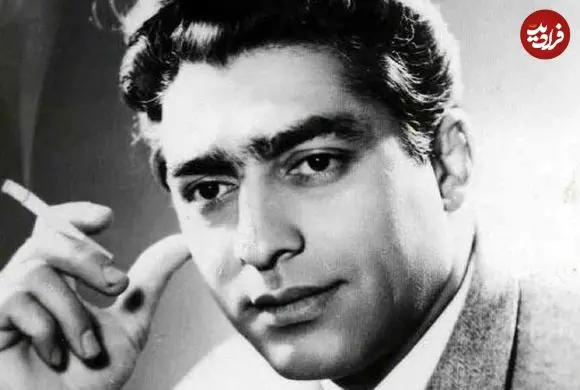 عکس| سفر در زمان؛ «فردین» در حال حساب و کتاب در مغازه فرش فروشی اش؛ دهه 70