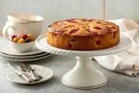 طرز تهیه کیک میوه‌ای خانگی نرم و خوشمزه در چند مرحله