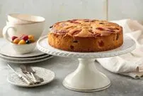 طرز تهیه کیک میوه‌ای خانگی نرم و خوشمزه در چند مرحله