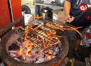 ببینید| غذای خیابانی در تایلند؛ تهیه غذاهای سنتی با میگو، هشت پا، خرچنگ نعل اسبی و ... در بانکوک