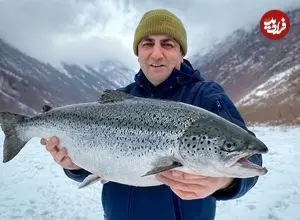 ببینید| غذای روستایی در آذربایجان؛ پخت ماهی سالمون پوشیده شده با نمک در هوای برفی