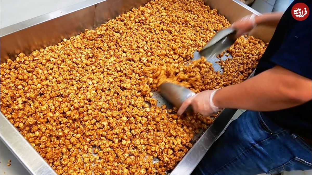ببینید| غذای خیابانی در آمریکا؛ آماده سازی پاپ کورن در شیکاگو