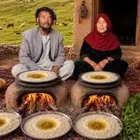 ببینید| غذای روستایی در افغانستان؛ پخت شیر برنج روی آتش توسط زوج مسن افغان