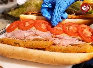 ویدئو| غذای خیابانی در آمریکا؛ تهیه ساندویچ هوگی در فیلادلفیا