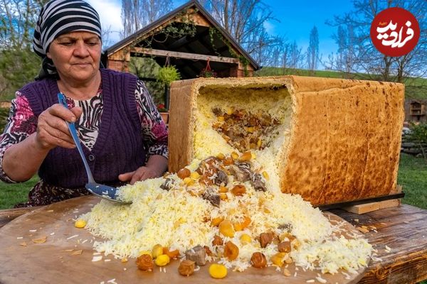 (ویدئو) پخت تماشایی شاه پلو با گوشت توسط یک زوج روستایی مشهور آذربایجانی