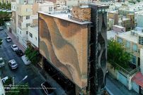 (تصاویر) نمای متفاوت یک ساختمان اداری در اراک؛ یک گندمزار آجری!