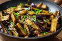 ببینید| طرز تهیه خوراک بادمجان ایتالیایی با سیر و سس سویا 