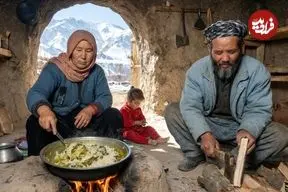ببینید| غذای روستایی در افغانستان؛ پخت گشنیز پلو توسط زوج مسن در روستا