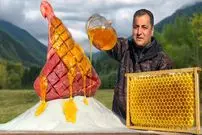 ببینید| غذای روستایی در آذربایجان؛ کباب ران گوساله با عسل و نمک در تنور 