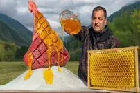 ببینید| غذای روستایی در آذربایجان؛ کباب ران گوساله با عسل و نمک در تنور 