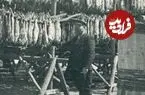 عکس| سفر زمان؛ ماهی‌های آویزان شده از داربست در بندر انزلی؛ 80 سال قبل
