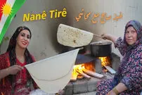 (ویدئو) پخت نان محلی روی ساج به روش یک مادر و دختر اهل اقلیم کردستان عراق