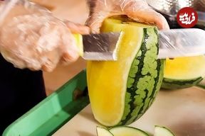 ببینید؛ برش ماهرانه هندوانه و تهیه آب هندوانه توسط فروشنده ماهر تایلندی