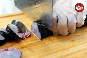 ببینید| غذای خیابانی در آمریکا؛ برش ماهرانه مارماهی و پخت دو نوع غذا با آن در نیویورک