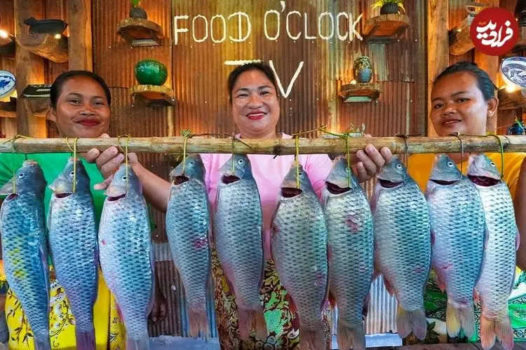 ببییند| غذای روستایی در سنگاپور؛ کباب ماهی کپور در تنور زیر زمینی بزرگ در روستا