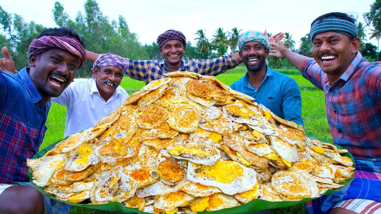 (ویدئو) پخت نیمرو با 1000 تخم مرغ توسط پدر و پسران روستایی مشهور هندی