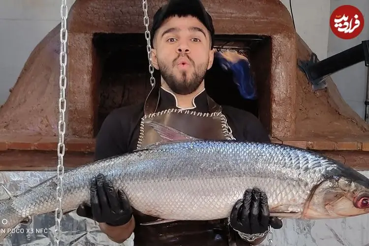 ببینید| غذای خیابانی در ایران؛ کباب ماهی بزرگ شکم پر با سبزی پلو