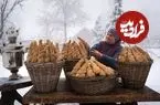 ببینید| غذای روستایی در آذربایجان؛ پخت نان کنجدی سنتی در هوای برفی